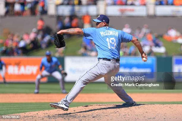 Dustin McGowan of the Tampa Bay Rays pitches during the Spring Training game against the Detroit Tigers at Publix Field at Joker Marchant Stadium on...