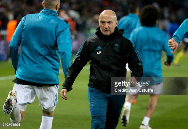 Fitness coach of Real Madrid Antonio Pintus directs the warm up session prior to the UEFA Champions League Round of 16 Second Leg match between Paris...