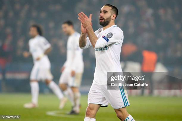 Daniel Carvajal of Real Madrid celebrates the goal of Cristiano Ronaldo during the UEFA Champions League Round of 16 Second Leg match between Paris...