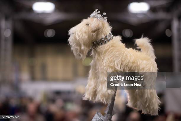 Stuffed toy of a Soft Coated Wheaten Terrier is seen on day two of the Cruft's dog show at the NEC Arena on March 9, 2018 in Birmingham, England. The...