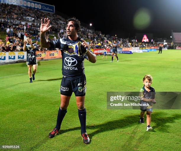 Johnathan Thurston of the Cowboys waves to the crowd at the end of his 300th NRL game during the round one NRL match between the North Queensland...