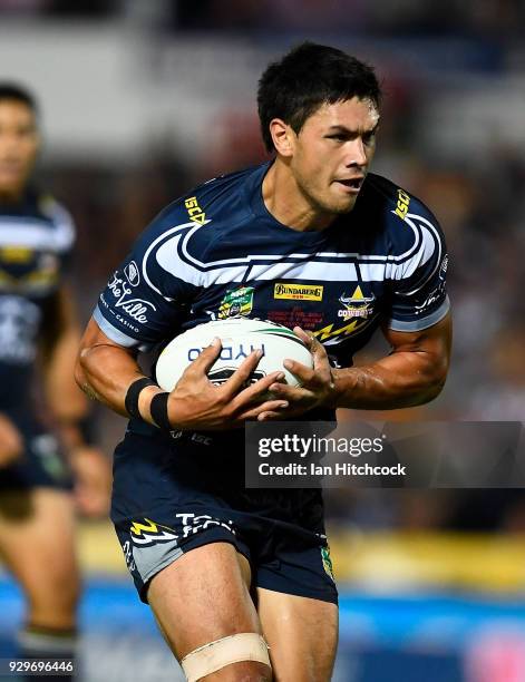 Jordan McLean of the Cowboys runs the ball during the round one NRL match between the North Queensland Cowboys and the Cronulla Sharks at 1300SMILES...