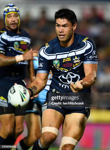 Jordan McLean of the Cowboys passes the ball during the round one NRL match between the North Queensland Cowboys and the Cronulla Sharks at...