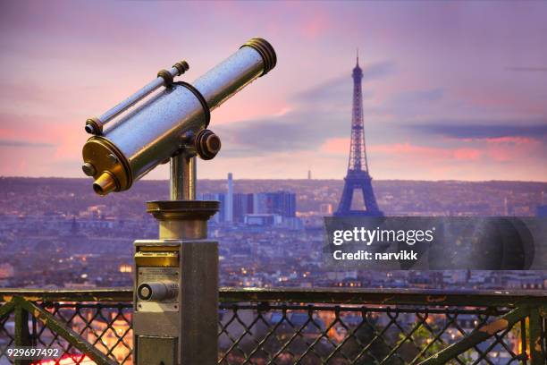 coin operated telescope with eiffel tower in paris - coin operated binocular nobody stock pictures, royalty-free photos & images