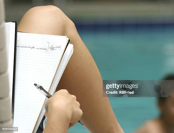 working by pool - grant writer stock pictures, royalty-free photos & images