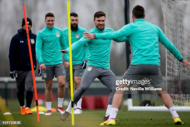 Scott Hogan of Aston Villa in action during a training session at the club's training ground at Bodymoor Heath on March 09, 2018 in Birmingham,...