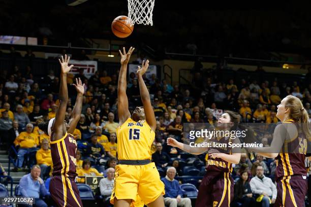 Toledo Rockets center Kaayla McIntyre puts back a rebound during a regular season Mid-American Conference game between the Central Michigan Chippewas...