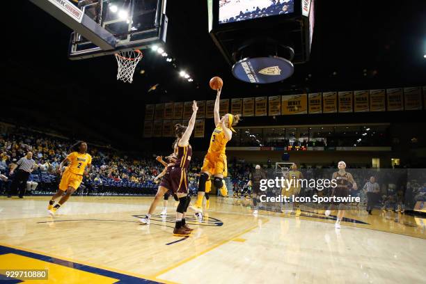 Toledo Rockets guard Mariella Santucci goes in for a layup during a regular season Mid-American Conference game between the Central Michigan...
