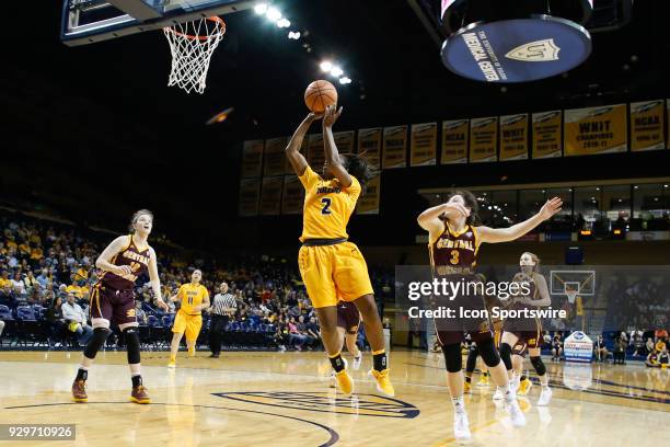 Toledo Rockets guard Mikaela Boyd goes in for a layup during a regular season Mid-American Conference game between the Central Michigan Chippewas and...