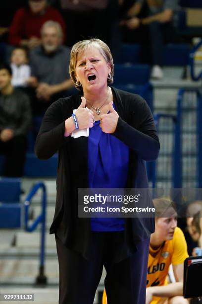Toledo Rockets head coach Tricia Cullop shouts instructions to her players during a regular season Mid-American Conference game between the Central...