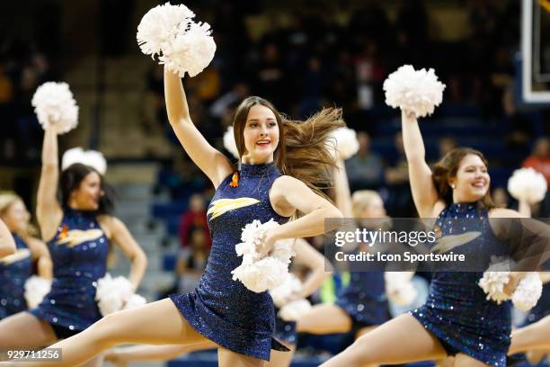 The Toledo Rockets dance team performs during a timeout during a regular season Mid-American Conference game between the Central Michigan Chippewas...