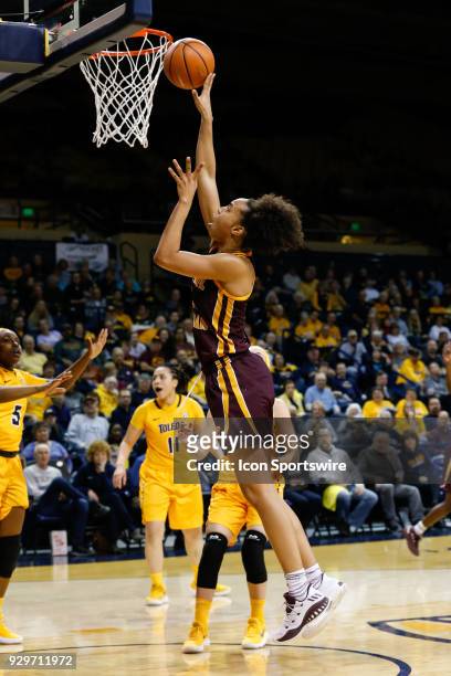 Central Michigan Chippewas forward Tinara Moore goes in for a layup during a regular season Mid-American Conference game between the Central Michigan...