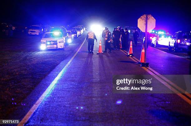 Corrections officers stand watch outside the Greensville Correctional Center November 10, 2009 near Jarratt, Virginia. DC sniper John Allen Muhammad...