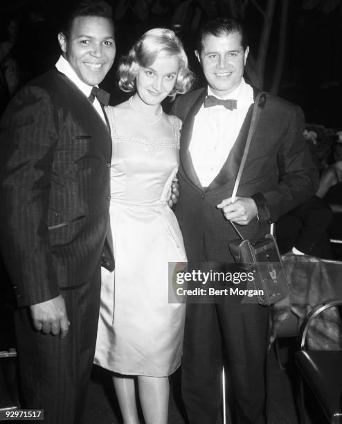 Chubby Checker with Mr and Mrs Fred Robins at the Twist Party held at the Four Seasons in NYC to benefit Girls Town in Plymouth, Florida, November 6,...