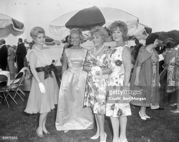 Hungarian actress Zsa Zsa Gabor with her mother, Jolie , and her sister Magda at an outdoor party in Palm Beach, 1960s