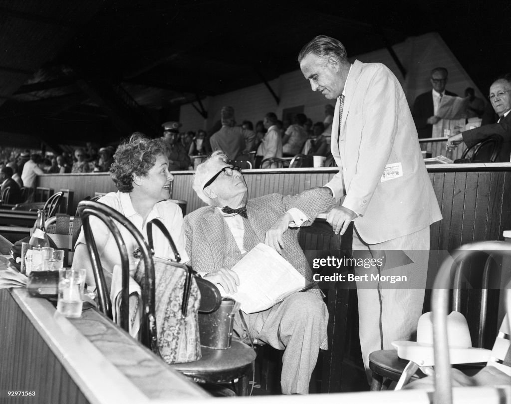 Elizabeh Navarro (secretary), Bernard Baruch, and Hon Averill Harriman at the Saratoga Race Track, Saratoga, NY c1958