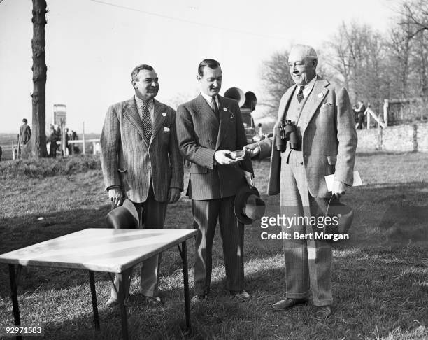 Jack Skinner, Paul Mellon, and Daniel C Sands at The Panther Skin in Middleburg, Virginia, April 10, 1948