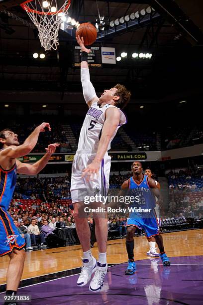 Andres Nocioni of the Sacramento Kings lays the ball in the basket against the Oklahoma City Thunder on November 10, 2009 at ARCO Arena in...