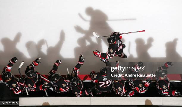 Peter Regin of the Ottawa Senators celebrates a goal against the Edmonton Oilers with teammates Filip Kuba, Brian Lee, Chris Phillips, Chris Campoli,...
