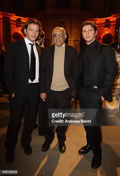 Manuele Malenotti and Michele Malenotti , vice presidents of Belstaff, and South African politician Ahmed Mohamed Kathrada attend the gala dinner...
