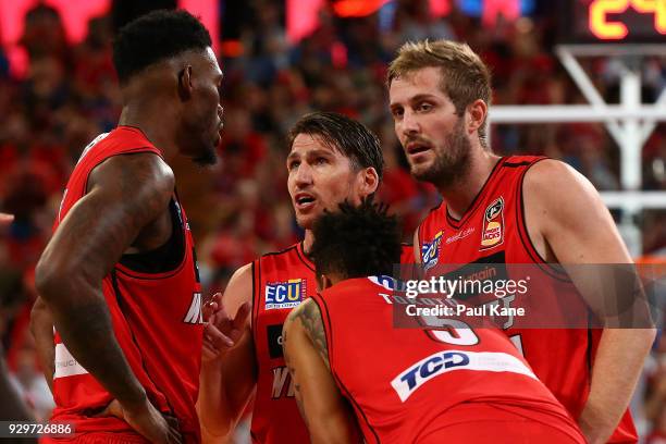Damian Martin of the Wildcats talks to Derek Cooke Jr., Jean-Pierre Tokoto and Jesse Wagstaff of the Wildcats during game two of the NBL Semi Final...