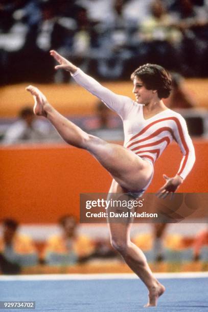 Mary Lou Retton of the USA performs in the floor exercise event during the Women's Gymnastics competition of the 1984 Summer Olympic Games held from...