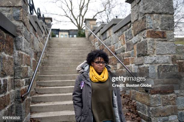 Shynnah Monge-Cueto walks to pick up her 1-year-old daughter Lyannah Cueto from her mother's house in Boston on March 6, 2018. Monge-Cueto took out...