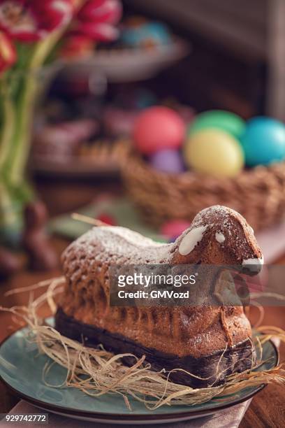 easter lamb cake served on a plate - easter lamb stock pictures, royalty-free photos & images