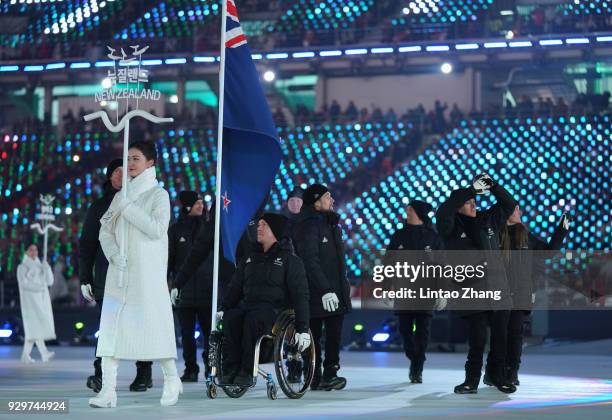 Flag bearer Corey Peters of New Zealand leads the team during the opening ceremony of the PyeongChang 2018 Paralympic Games at the PyeongChang...