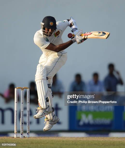 Angelo Mathews of Sri Lanka deals with a short-pitched delivery during the 2nd Test match between Sri Lanka and England at the P Sara Oval, Colombo,...