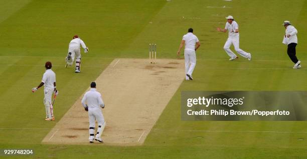 West Indies batsman Kirk Edwards is run out by Jonny Bairstow of England during the 1st Test match between England and West Indies at Lord's Cricket...