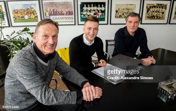 Marco Reus of Borussia Dortmund attends his contract extension signing for Borussia Dortmund with Hans-Joachim Watzke the CEO of Borussia Dortmund...