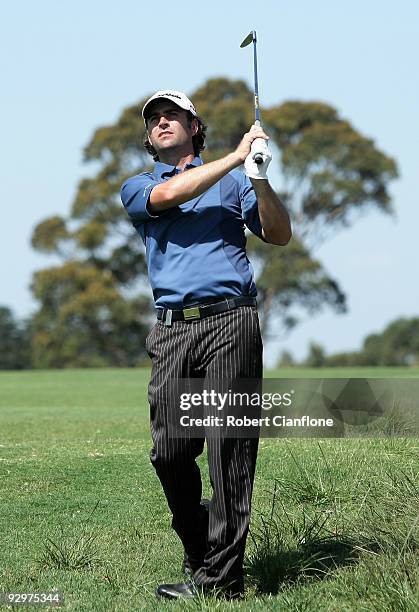 Matthew Goggin of Australia plays an approach shot on the 9th hole during the Pro-Am ahead of the 2009 Australian Masters at Kingston Heath Golf Club...