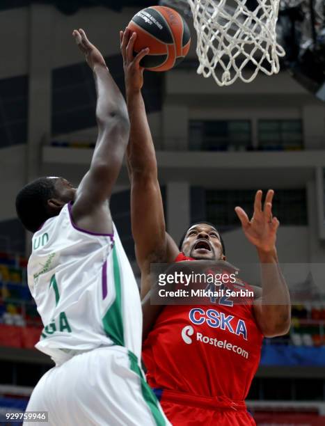 Kyle Hines, #42 of CSKA Moscow competes with Viny Okouo, #2 of Unicaja Malaga in action during the 2017/2018 Turkish Airlines EuroLeague Regular...