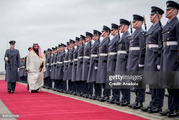 Crown Prince and Defense Minister of Saudi Arabia Mohammad bin Salman al-Saud walks past the honor guards during an official welcoming ceremony by...