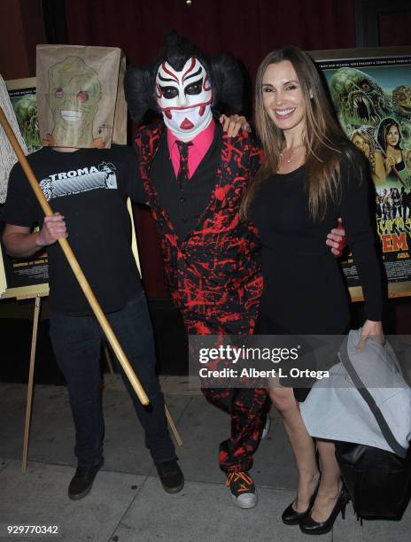 The Toxic Avenger, Sgt. Kabukiman NYPD and Tanya Tate attend the Film Opening of 'Return to Return to Nuke 'Em High Aka Vol. 2 ' held at Laemmle's...