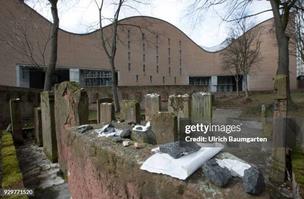 Museum Judengasse in Frankfurt/Main - memorial Neuer Boerneplatz. Grave stones on the old Jewish cementary. In the background the building of the...