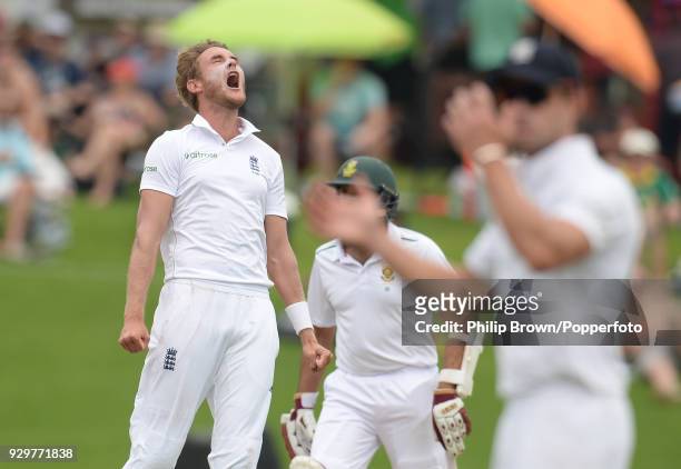 Stuart Broad of England reacts after Stephen Cook of South Africa is dropped on 47 by England wicketkeeper Jonny Bairstow during the 4th Test match...