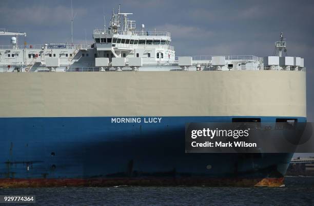 An outbound cargo ship named Morning Lucy, travels down the Patapsco River, March 9, 2018 in Baltimore, Maryland. U.S. President Donald Trump...