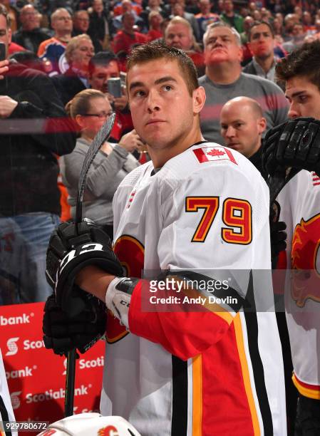 Micheal Ferland of the Calgary Flames stands for the singing of the national anthem prior to the game against the Edmonton Oilers on January 25, 2017...