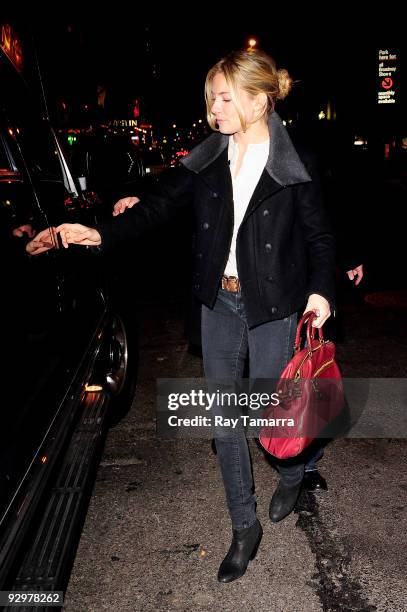 Actress Sienna Miller greets fans outside of the American Airlines Theatre on November 10, 2009 in New York City.