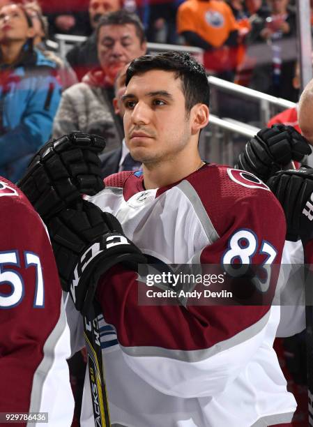 Matt Nieto of the Colorado Avalanche stands for the singing of the national anthem prior to the game against the Edmonton Oilers on February 1, 2018...