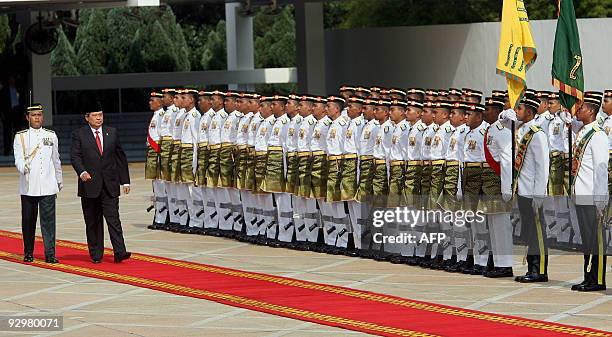 Indonesian President Susilo Bambang Yudhoyono inspects an honour guard during the official welcoming ceremony at the parliament square in Kuala...