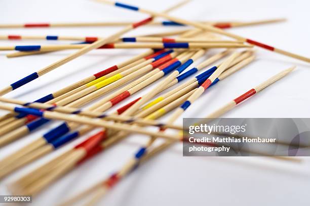 mikado sticks on white background - mikado stock pictures, royalty-free photos & images