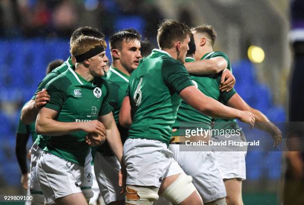 Dublin , Ireland - 9 March 2018; Jack O'Sullivan of Ireland is congratulated by his team-mates after scoring his side's first try during the U20 Six...