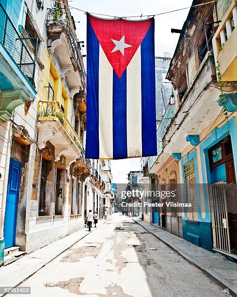 streets of havana. - cuban flag ストックフォトと画像