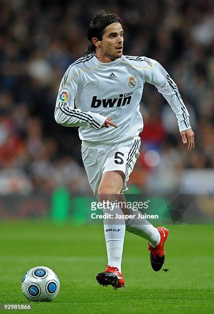 Fernando Gago of Real Madrid runs with the ball during the Copa del Rey fourth round, second leg match between Real Madrid and AD Alcorcon at the...