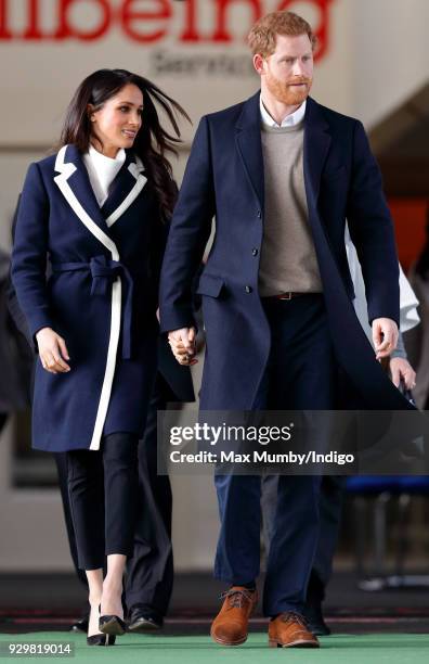 Meghan Markle and Prince Harry depart after visiting Nechells Wellbeing Centre on March 8, 2018 in Birmingham, England.