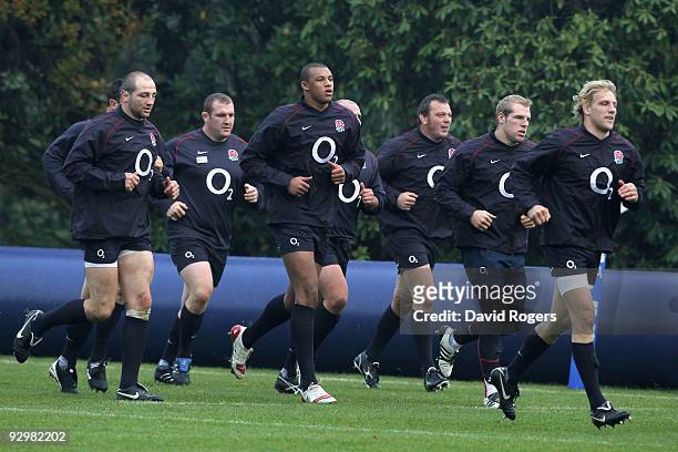England Forwards warm up during the England training session at Pennyhill Park on November 11, 2009 in Bagshot, England.