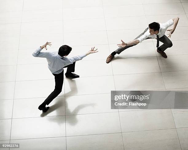 two businessmen confronting each other  - championship day two stock pictures, royalty-free photos & images